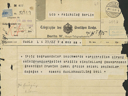 Telegramm mit Beschädigungen an den Ecken und Rändern