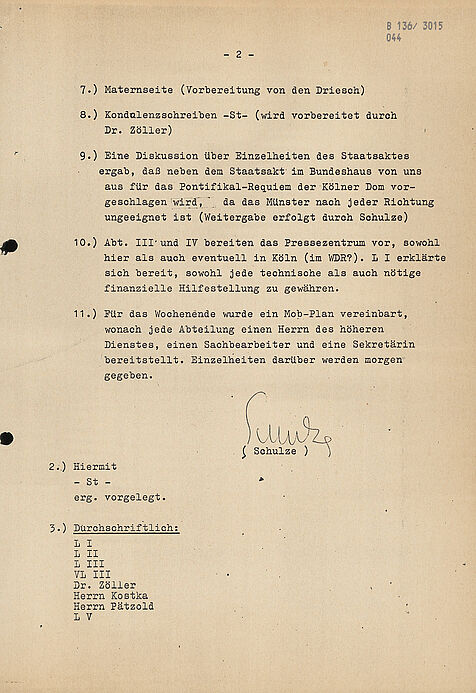 Maschinengeschriebenes Dokument mit nummerierten Absätzen und händischer Unterschrift