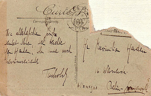 Rückseite einer Ansichtskarte mit Poststempeln und handschriftlichem Grußtext