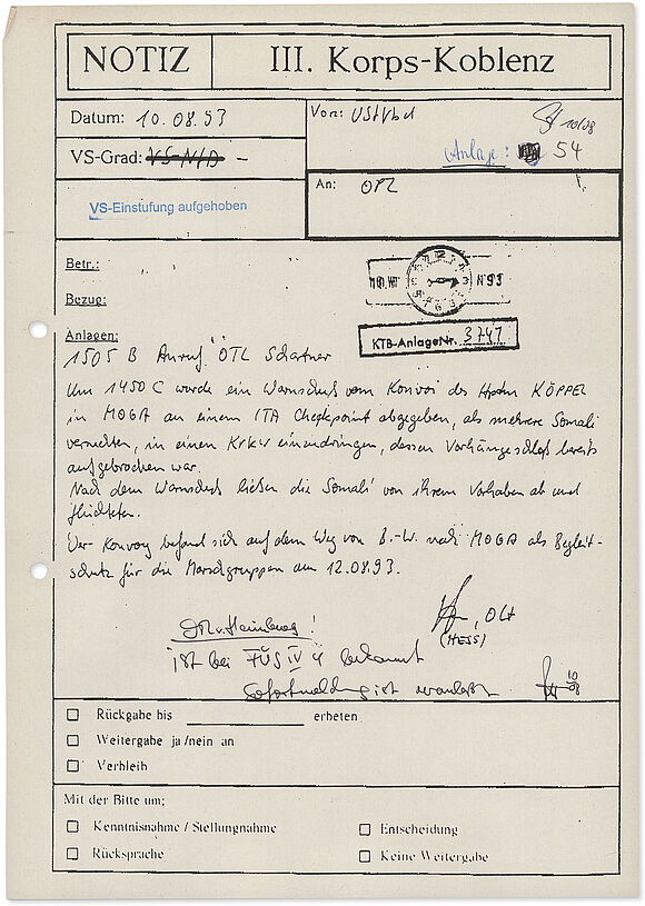 Grauer Dokumentenvordruck mit handschriftlicher Meldung