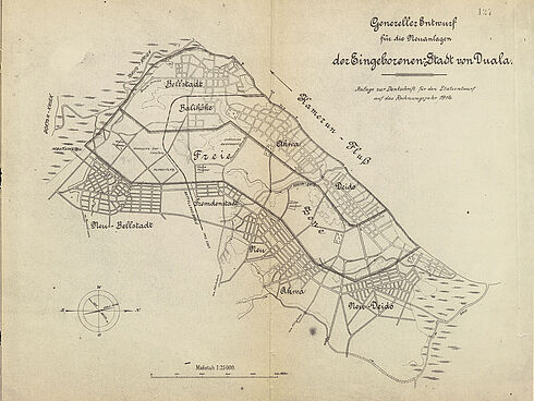 Plan von einer Stadt, auf dem verschiedene Viertel und ein größeres Gebiet mit der Bezeichnung "Freie Zone" eingezeichnet sind.