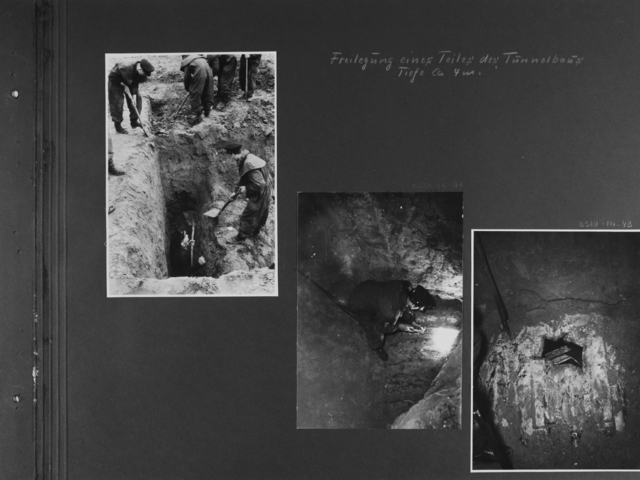 [handschriftliche Ergänzung: Freilegung eines Teiles des Tunnelbaus Tiefe ca. 4m.]  [Bild 1: Vier Männer mit Spaten und Schaufeln stehen auf unterschiedlichen Höhen und sind dabei, ein Loch auszuheben. Ein sechster steht in diesem rechteckigen Loch, was so tief ist, dass es ihm bis über den Kopf reicht.]  [Bild 2: In das ausgehobene Rechteck hinein fotografiert sieht man einen Mann, der auf einem rundlichen Metallbogen kauert und dabei ist, einen Einstieg zu schweißen. Er trägt eine Schweißerbrille.]  [Bild 3: In die rechteckige Einstiegsluke ragen noch zwei Streben des Bleches, in die sie geschweißt wurde. Der freigelegte Bereich ist umgeben von Sand.]