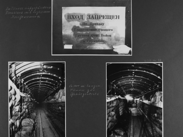 [handschriftliche Ergänzung: Im Tunnel aufgefundene Schablone mit englischen Schriftvermerk] [Bild 1: Eine helle Schablone wird am unteren rechten Rand vor einen schwarzen Hintergrund gehalten. Es sind kyrillische Buchstaben ausgeschnitten und noch Spuren von schwarzer Farbe deutlich zu erkennen.]  [Bild 2 und 3: Im Hochkantformat wurde in den langen Tunnel mit der gewölbten Decke hinein fotografiert. Auf beiden Seiten sind Regale voller Leinensäcke.] [mittig dazwischen die handschriftliche Ergänzung: Ca. 400 m. langer Tunnel zur Abhörzentrale]